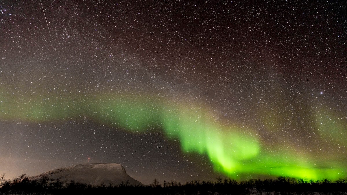 Northern Lights & the Milky Way over Saana, Finland.